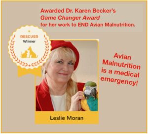 Karen Becker DVM, awards Game Changer Award to Leslie Moran